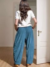 Wide leg pants in teal corduroy with a relaxed elastic waistband casual corduroy wide leg style with pockets