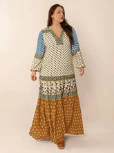 Plus size printed balloon sleeve maxi dress with tiered pattern