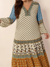 Plus size printed balloon sleeve maxi dress with cream and blue floral tiered skirt