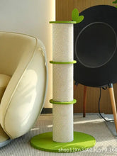 Green and white bamboo shaped cat scratching post with heart top
