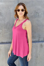 A vibrant pink basic bae cutout cami featuring a sleeveless design with delicate lace trim at the v-neckline