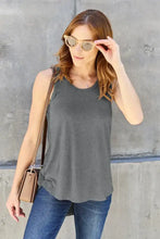 A soft dark gray sleeveless tank top with a relaxed fit and neck curved hem from basic bae collection
