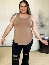 Beige sleeveless basic bae tank top with full size round neck curved hem made from soft fabric for everyday wear