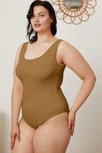 A sleek mustard-colored seamless basic bae full size square neck sleeveless bodysuit with a scoop neckline