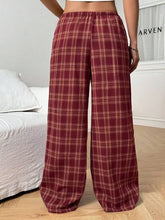 Red and white plaid wide leg pants with elastic waistband and drawstring for comfortable casual wear
