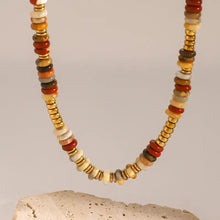 Rustic beaded choker necklace with natural stone, earthy tones, and 18k gold-plated accents