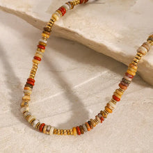 Vibrant beaded choker necklace with natural stone disc beads and 18k gold-plated accents