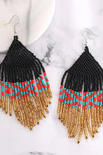Black, red, turquoise and gold beaded dangle earrings with soft cloth fringe