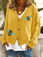 Bee embroidered yellow knit cardigan with v-neck, brown buttons