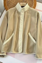 Beige and cream fleece button-up jacket with pockets in every size