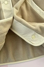 Beige fleece-lined button-down jacket with pockets, available in every size