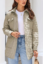 Khaki quilted jacket with high collar, pockets, and button closure