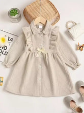 Beige collared neck dress with ruffled bow for babies