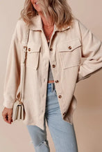 Beige corduroy button down utility jacket with pockets, casual style