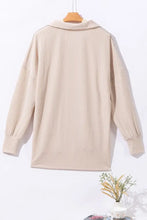 Beige corduroy cardigan jacket with ribbed texture, sequins, and gold hardware