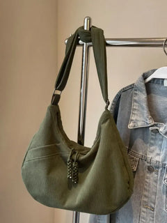 Star patchwork denim medium shoulder bag with chain strap, made of polyester and denim, stylish and trendy, available in ivory, dusty blue, and medium tones