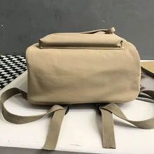 Beige cotton backpack bag with tan canvas and zippered compartments
