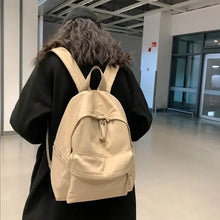 Beige cotton backpack bag with zippered compartments