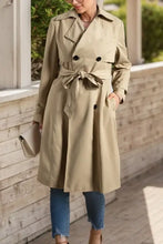 Beige double-breasted trench coat with belt and buttons