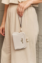 Beige Pebbled Vegan Leather Clutch with Pearl Accent and Wrist Strap