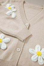 Beige floral cardigan sweater with white and yellow embroidered flowers