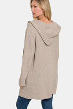 Beige hooded open sweater cardigan with pockets and fur trim