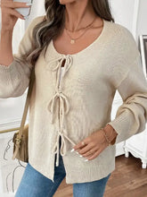 Beige lace-up balloon sleeve knitted sweater with V-neck and long sleeves