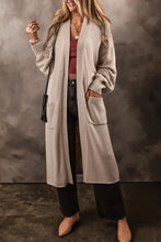 Beige long cardigan with pockets and ribbed cuffs