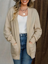 Beiger Langarm-Strickjacke mit Taschen und lockerem Schnitt