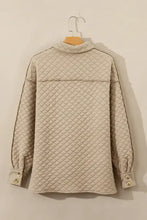 Beige quilted jacket with seam collared neck button details