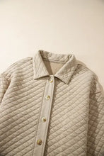 Beige quilted jacket with seam collared neck button