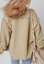 Beige quilted jacket with seam collared neck button and fur-lined hood