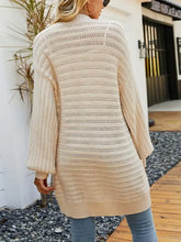 Cardigan beige légèrement extensible avec poches et détails côtelés