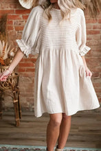 Beige smocked babydoll dress with stretchy bodice