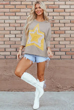 Beige star appliqué floral top in soft cotton blend with yellow accents