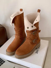 Beige suede buckle strap boots with fur lining and white trim