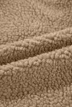 Beige teddy bear coat blanket with hood, pockets, and plush fleece texture