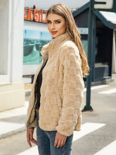 Beige textured faux fur jacket with high collar and long sleeve length