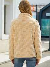 Beige textured faux fur jacket with high collar and long sleeve length