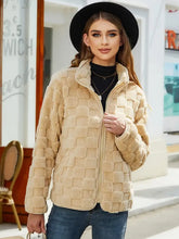 Beige textured faux fur jacket with high collar and long sleeve length