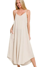 Beige woven arc hem cami dress with flowy pockets