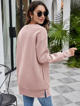 Oversized long-sleeved graphic tunic sweatshirt in dusty pink