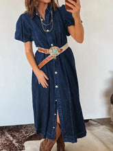 Dark blue midi denim dress with short puffed sleeves and front button closure in belted button-down style