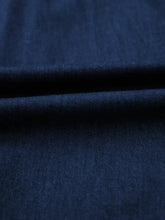 Deep navy blue midi denim dress with soft textured weave and belted button-down design