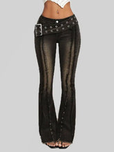 Black distressed denim belted high waist flare jeans with wide belt featuring silver-toned eyelets and buckle