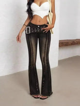 Black sheer belted high waist flare jeans with a bold silver buckle belt for a stylish high waist flare look
