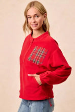 Red fleece sweatshirt with plaid patch pocket and buttoned front from bibi christmas fleece buttoned top with care instructions