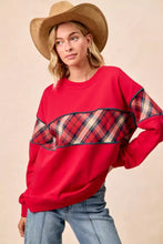 Red BiBi Christmas theme plaid block sweatshirt with black trim featuring a plaid pattern on chest and sleeves