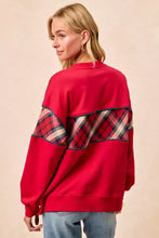Red sweatshirt featuring plaid block patchwork sleeves in red white and navy from bibi christmas collection