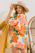 BiBi Floral V-Neck Slit T-Shirt with vibrant oversized floral tunic top